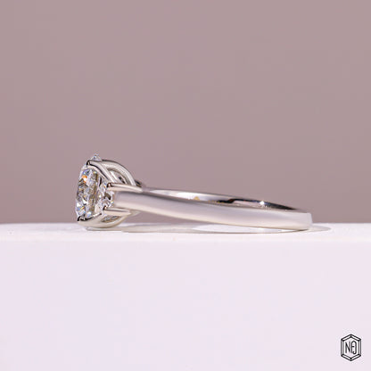 2.08 Carat Round Cut Lab Grown Diamond Trellis Three-Stone Engagement Ring - Angled Perspective