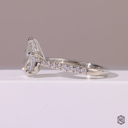 2.29 Carat Pear Cut Lab Grown Diamond Side Stone Pavé Engagement Ring - Angled Perspective