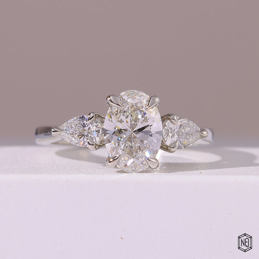 1.5 Carat Oval Cut Lab Grown Diamond Trellis Three-Stone Engagement Ring - Front Top View