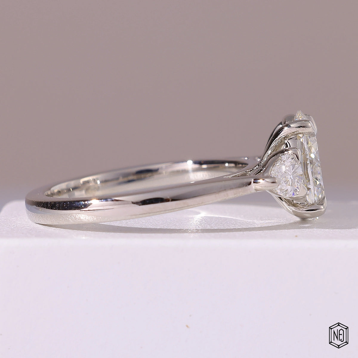 1.5 Carat Oval Cut Lab Grown Diamond Trellis Three-Stone Engagement Ring - Side Profile Angle