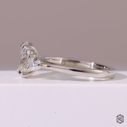 1.5 Carat Oval Cut Lab Grown Diamond Trellis Three-Stone Engagement Ring - Angled Perspective