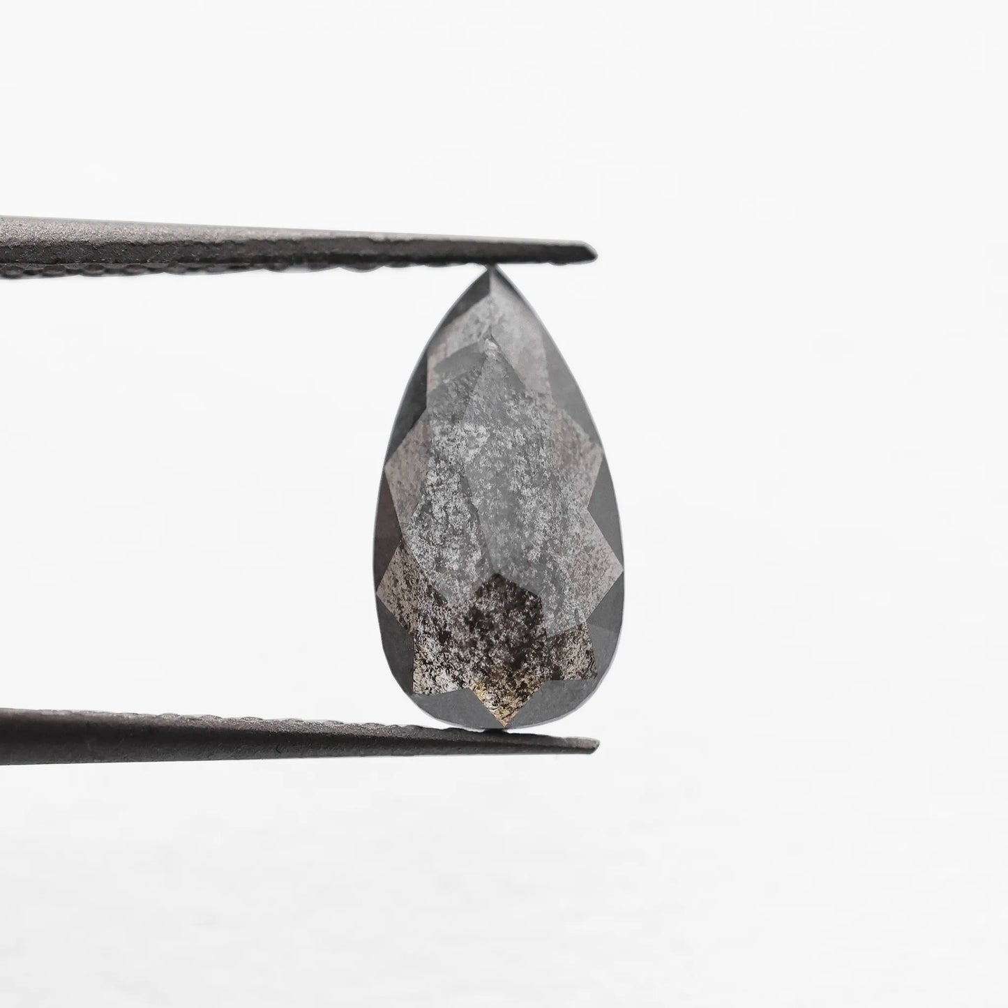 0.64 Ct Pear Brilliant Cut Salt and Pepper Diamond
