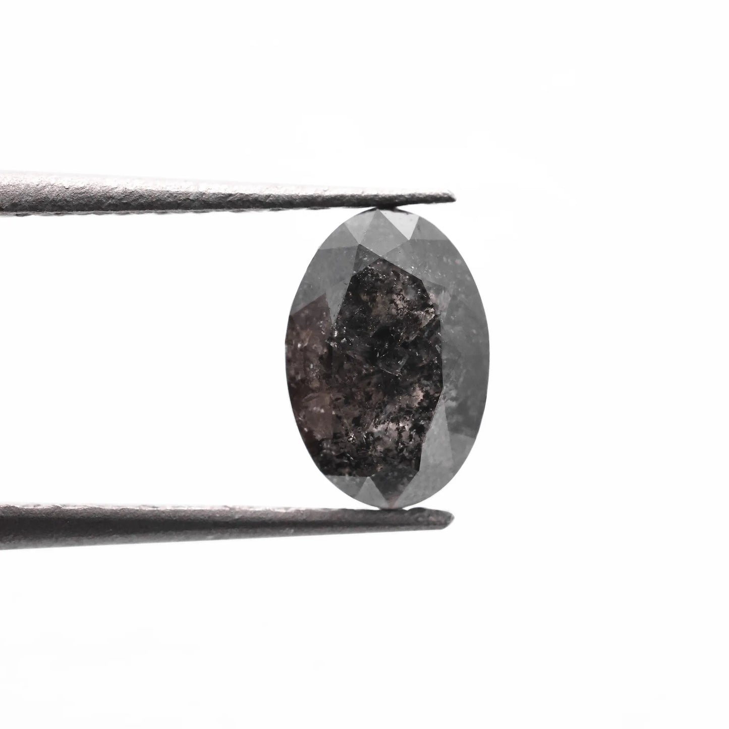 0.54 Ct Oval Brilliant Cut Salt and Pepper Diamond