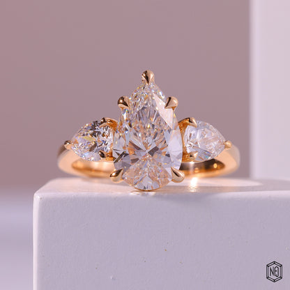 4.01 Carat Pear Cut Lab Grown Diamond Trellis Three-Stone Engagement Ring - Front Top View