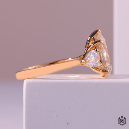 4.01 Carat Pear Cut Lab Grown Diamond Trellis Three-Stone Engagement Ring - Side Profile Angle