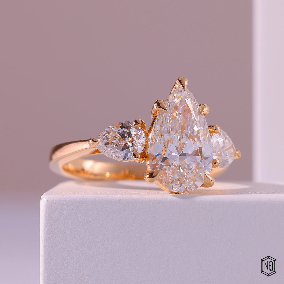 4.01 Carat Pear Cut Lab Grown Diamond Trellis Three-Stone Engagement Ring - Gallery & Prongs Detail