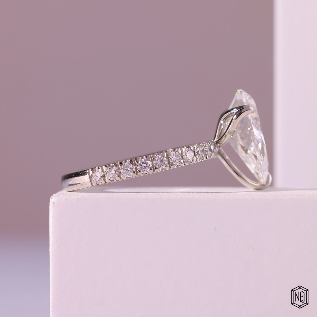 3.71 Carat Pear Cut Lab Grown Diamond Side Stone Pavé Engagement Ring - Side Profile Angle