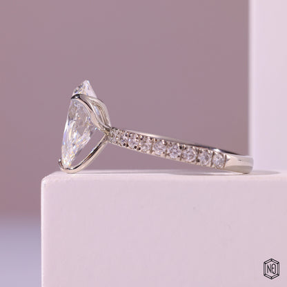 3.71 Carat Pear Cut Lab Grown Diamond Side Stone Pavé Engagement Ring - Angled Perspective