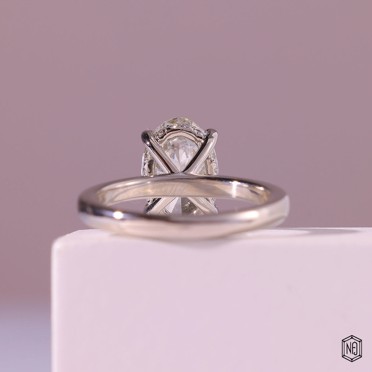 2.56 Carat Oval Cut Lab Grown Diamond Delicate Hidden Halo Engagement Ring - Hand View / Detail Angle