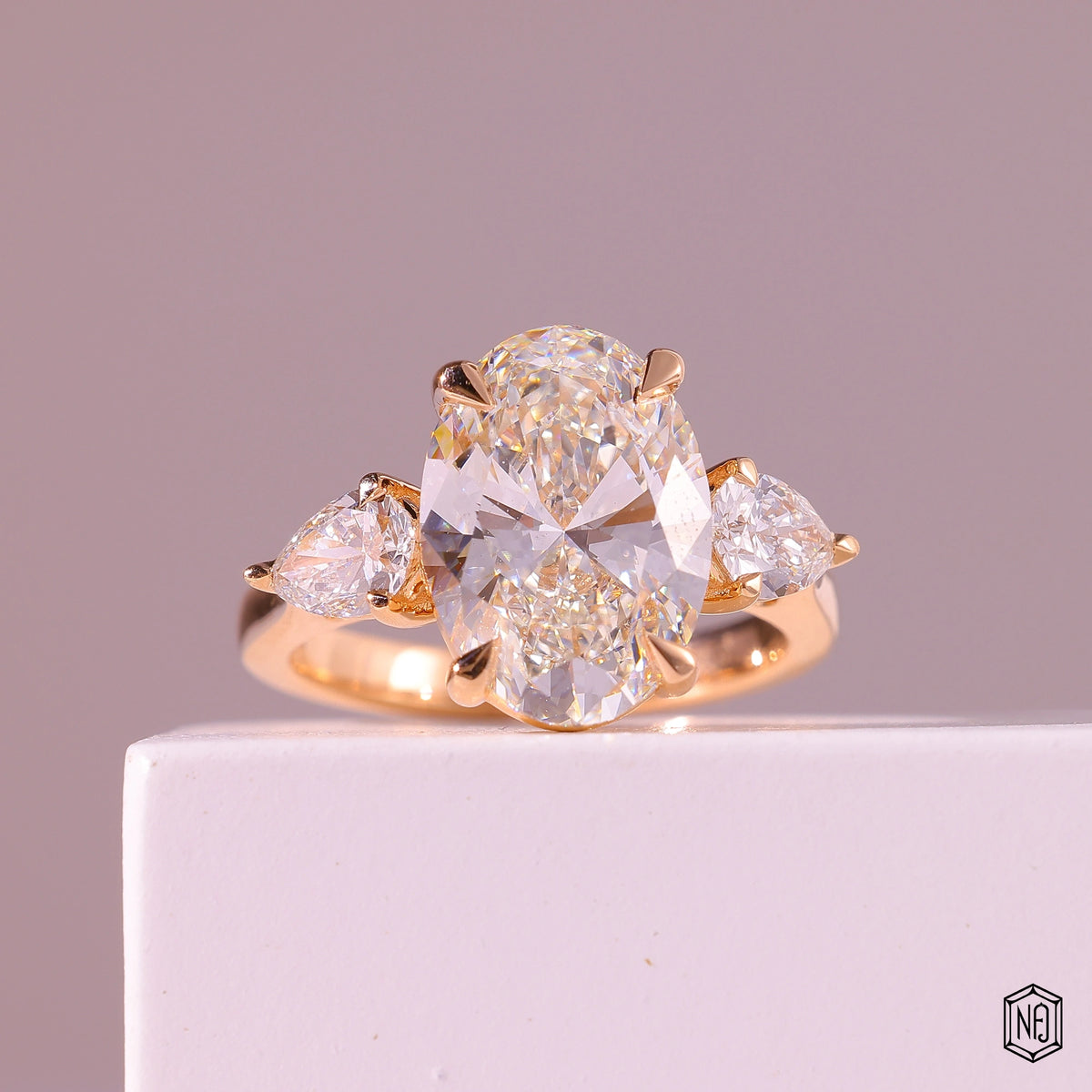 4.03 Carat Oval Cut Lab Grown Diamond Trellis Three-Stone Engagement Ring - Front Top View