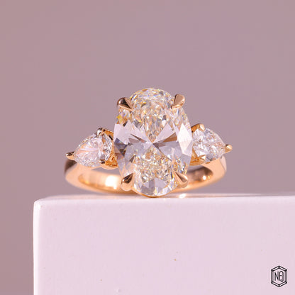 4.03 Carat Oval Cut Lab Grown Diamond Trellis Three-Stone Engagement Ring - Front Top View