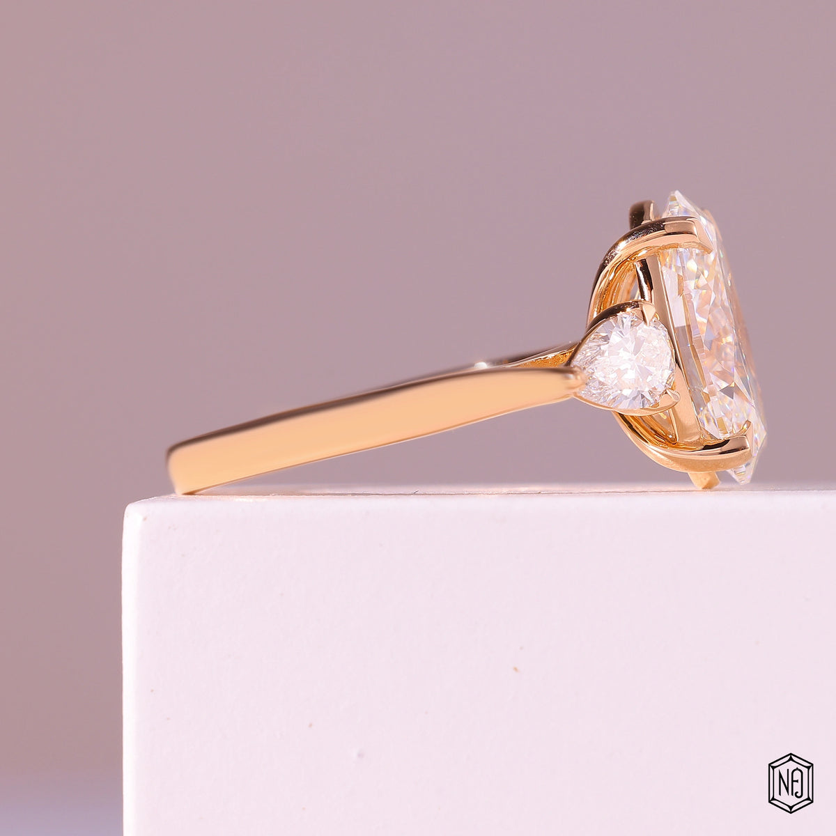 4.03 Carat Oval Cut Lab Grown Diamond Trellis Three-Stone Engagement Ring - Side Profile Angle