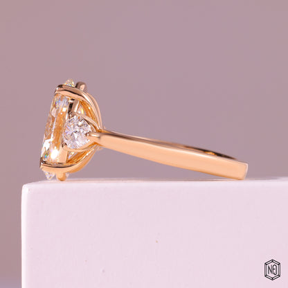 4.03 Carat Oval Cut Lab Grown Diamond Trellis Three-Stone Engagement Ring - Angled Perspective