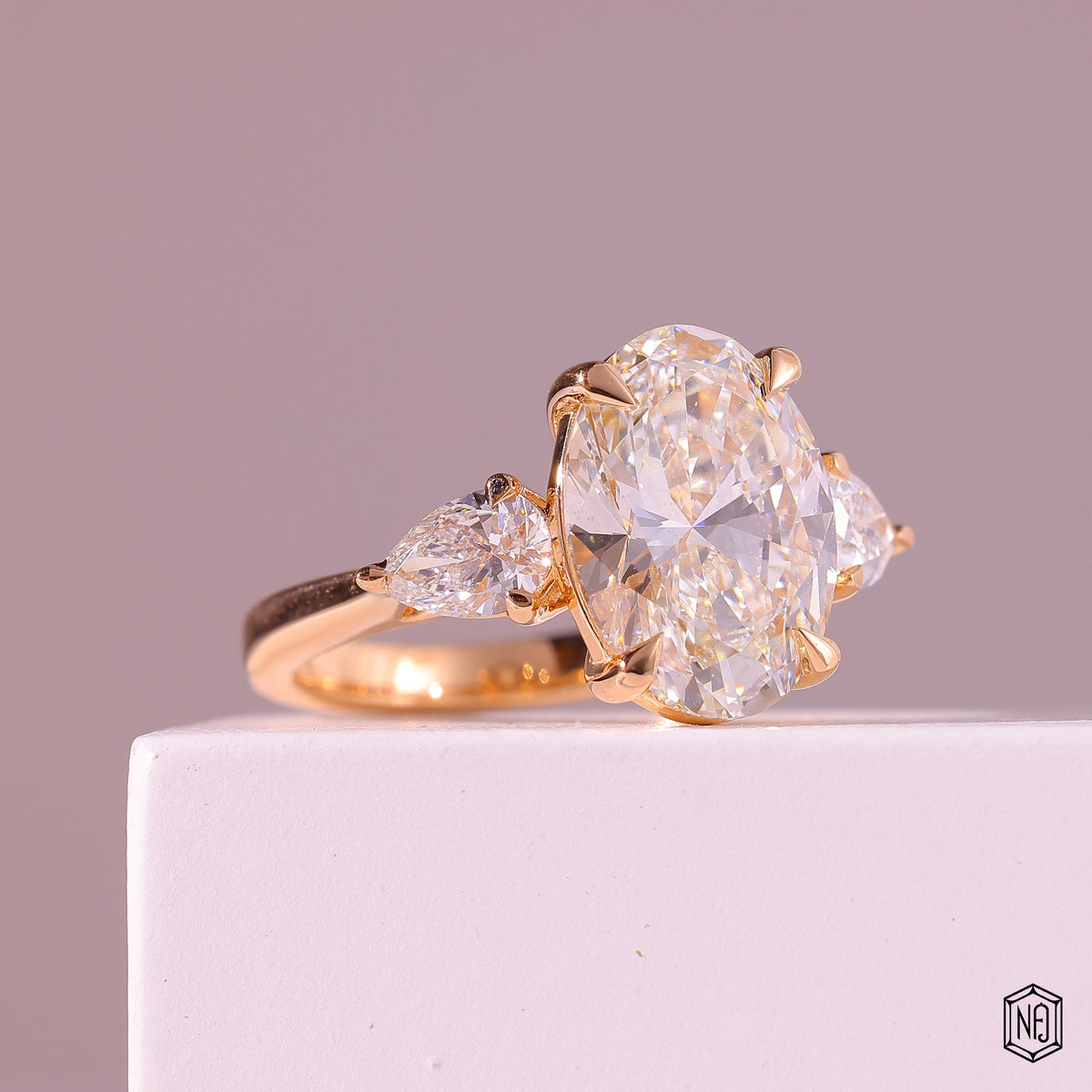 4.03 Carat Oval Cut Lab Grown Diamond Trellis Three-Stone Engagement Ring - Gallery & Prongs Detail