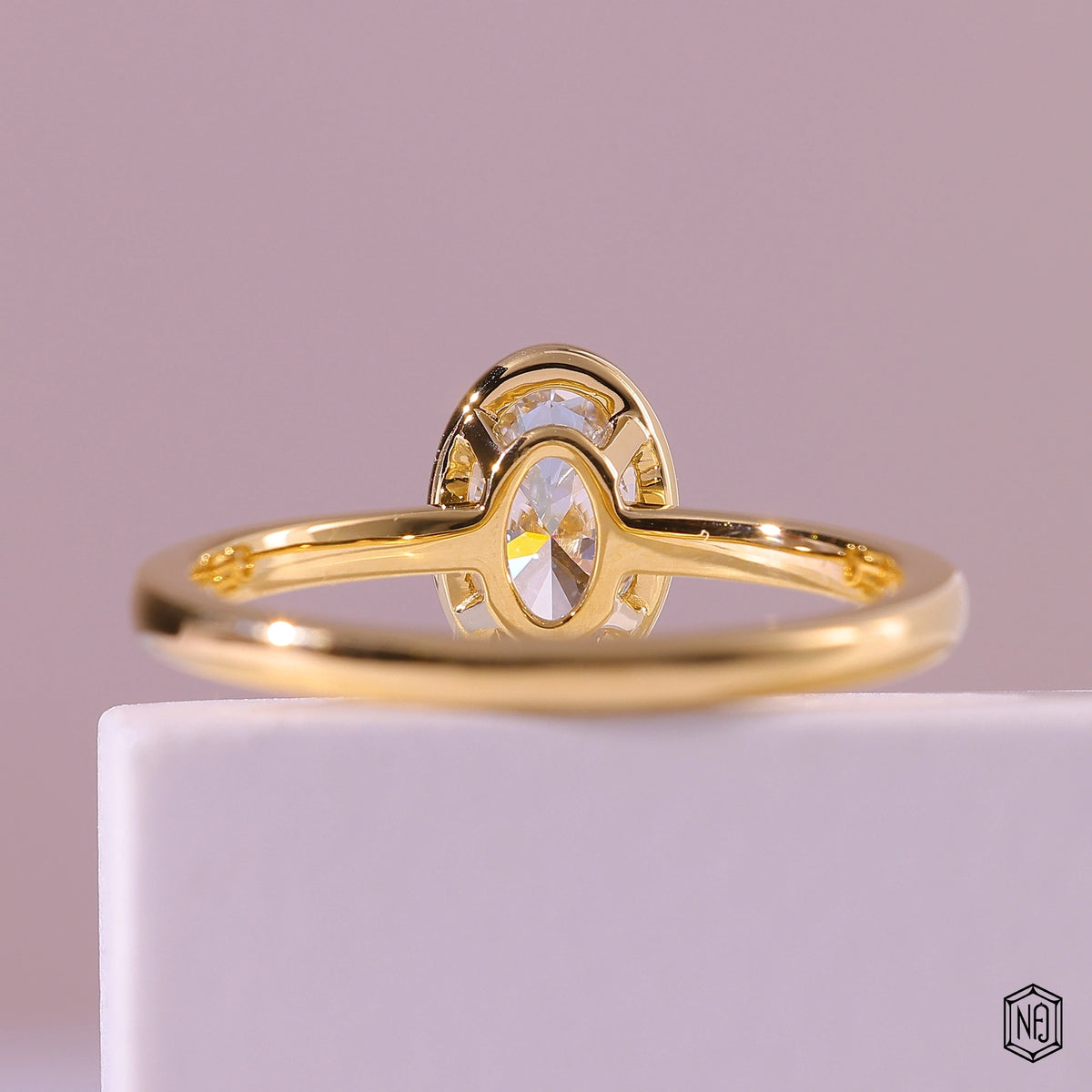 1.02 Carat Oval Cut Lab Grown Diamond Modern Bezel Engagement Ring - Hand View / Detail Angle