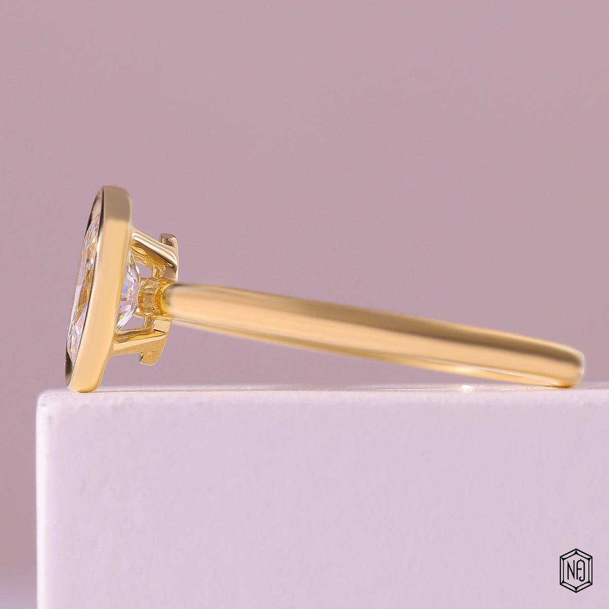 1.02 Carat Oval Cut Lab Grown Diamond Modern Bezel Engagement Ring - Angled Perspective