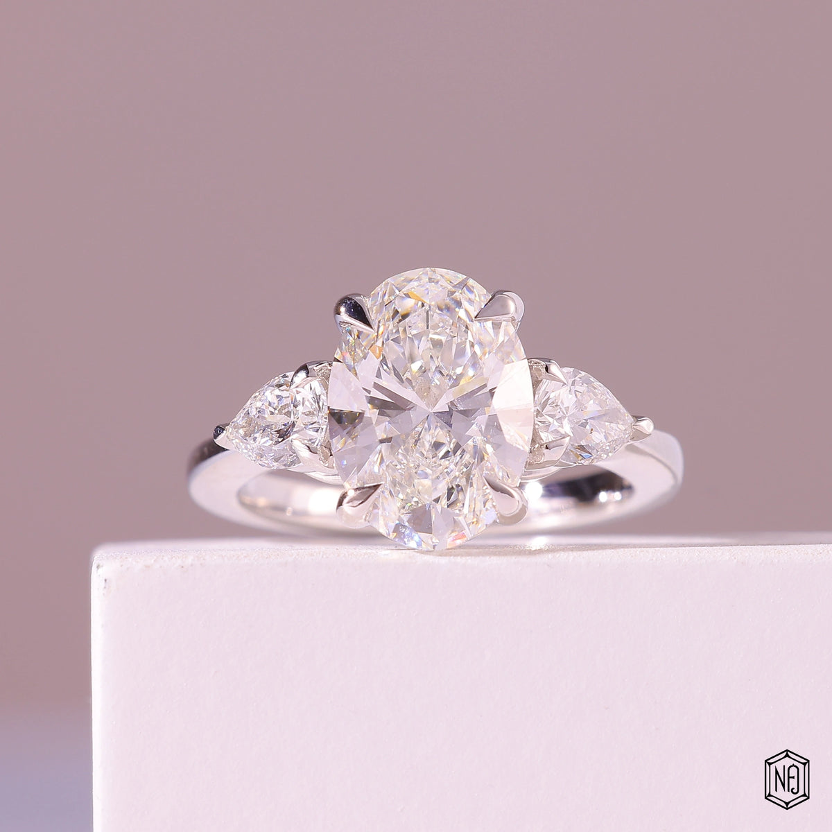 3.19 Carat Oval Cut Lab Grown Diamond Trellis Three-Stone Engagement Ring - Front Top View