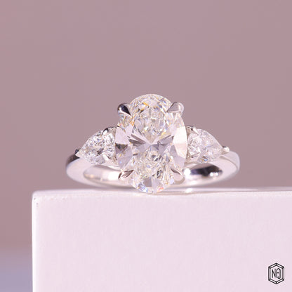 3.19 Carat Oval Cut Lab Grown Diamond Trellis Three-Stone Engagement Ring - Front Top View
