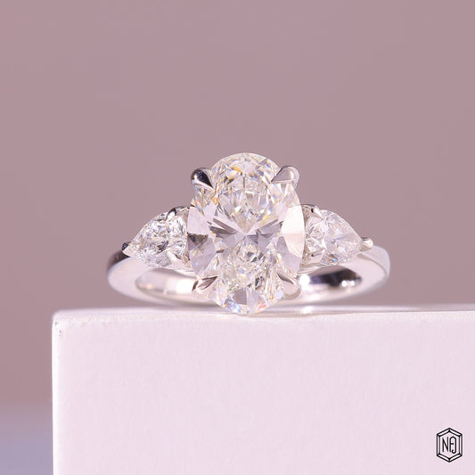 3.19 Carat Oval Cut Lab Grown Diamond Trellis Three-Stone Engagement Ring - Front Top View