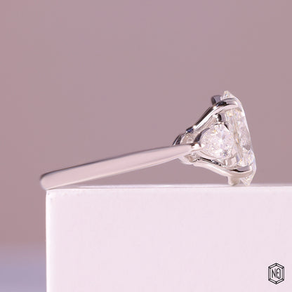 3.19 Carat Oval Cut Lab Grown Diamond Trellis Three-Stone Engagement Ring - Side Profile Angle