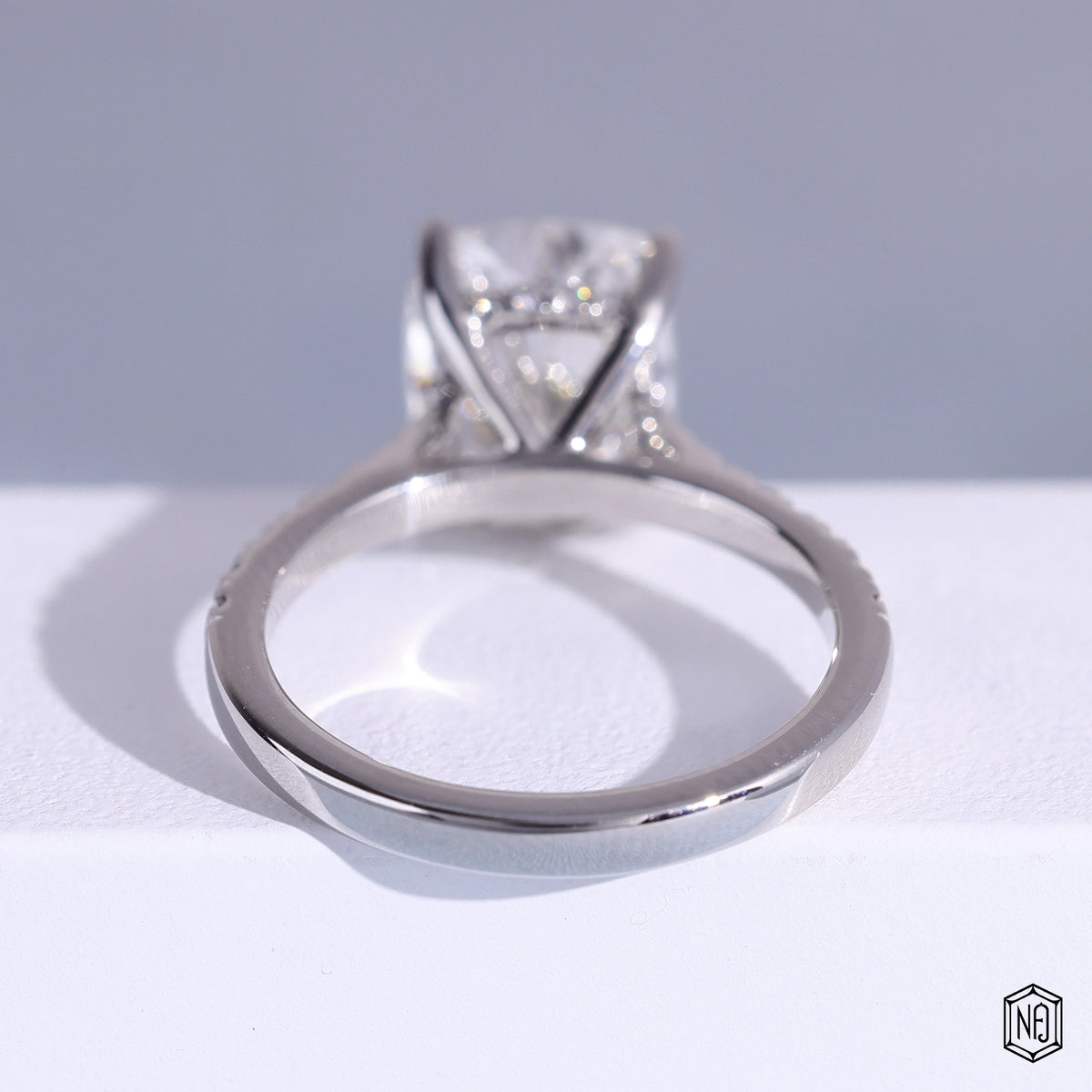 3.51 Carat Cushion Cut Lab Grown Diamond Side Stone Pavé Engagement Ring - Hand View / Detail Angle