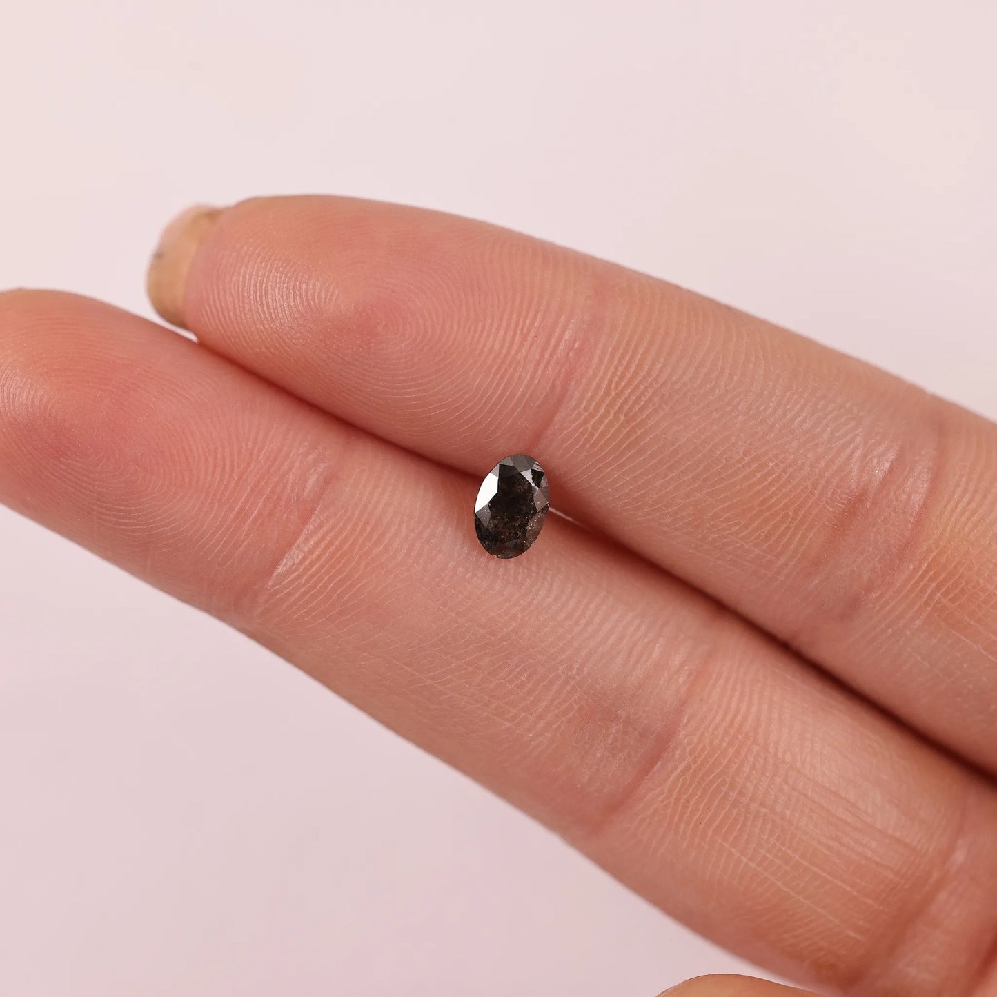 0.54 Ct Oval Brilliant Cut Salt and Pepper Diamond