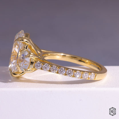 6.08 Carat Oval Cut Lab Grown Diamond Trellis Three-Stone Engagement Ring - Angled Perspective