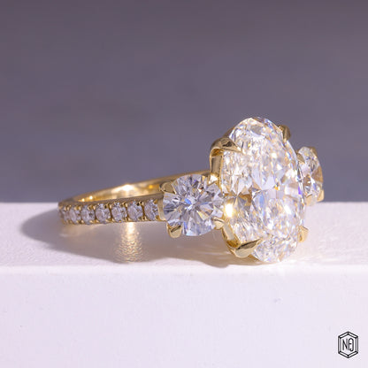 6.08 Carat Oval Cut Lab Grown Diamond Trellis Three-Stone Engagement Ring - Gallery & Prongs Detail