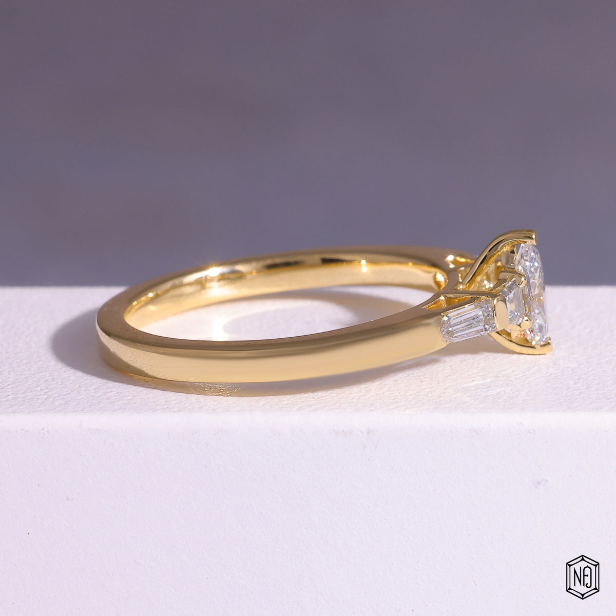 0.24 Carat Marquise Cut Lab Grown Diamond Trellis Three-Stone Engagement Ring - Side Profile Angle