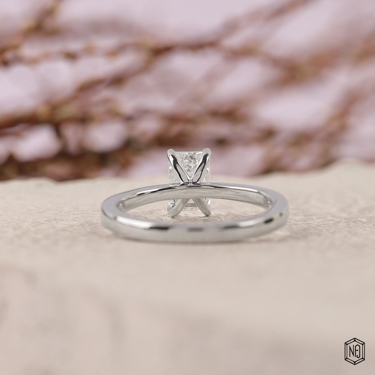 0.84 Carat Emerald Cut Lab Grown Diamond Classic Solitaire Engagement Ring - Hand View / Detail Angle