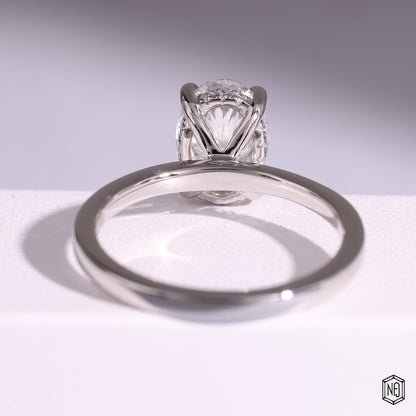 1.44 Carat Oval Cut Lab Grown Diamond Delicate Hidden Halo Engagement Ring - Hand View / Detail Angle