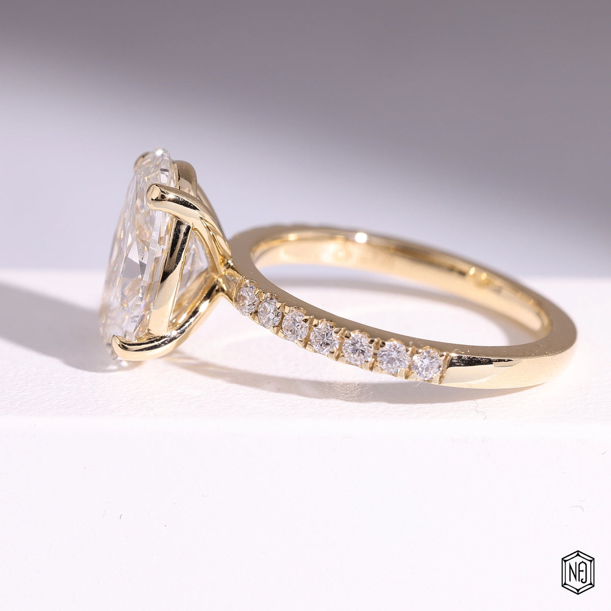 3.22 Carat Oval Cut Lab Grown Diamond Side Stone Pavé Engagement Ring - Angled Perspective