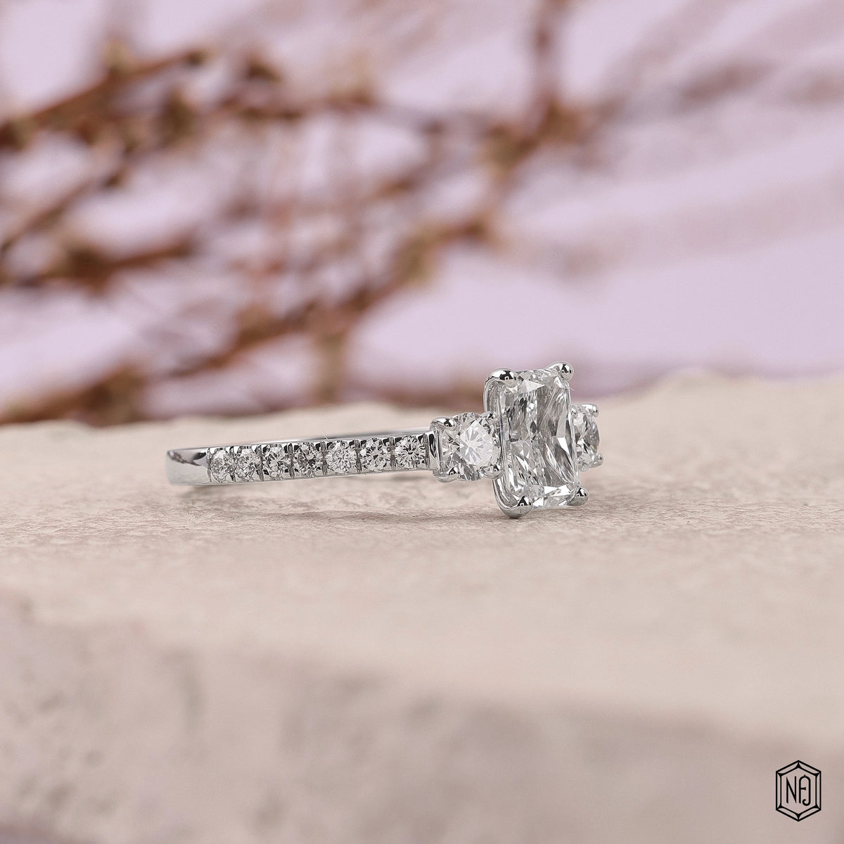 1 Carat Radiant Cut Lab Grown Diamond Trellis Three-Stone Engagement Ring - Gallery & Prongs Detail
