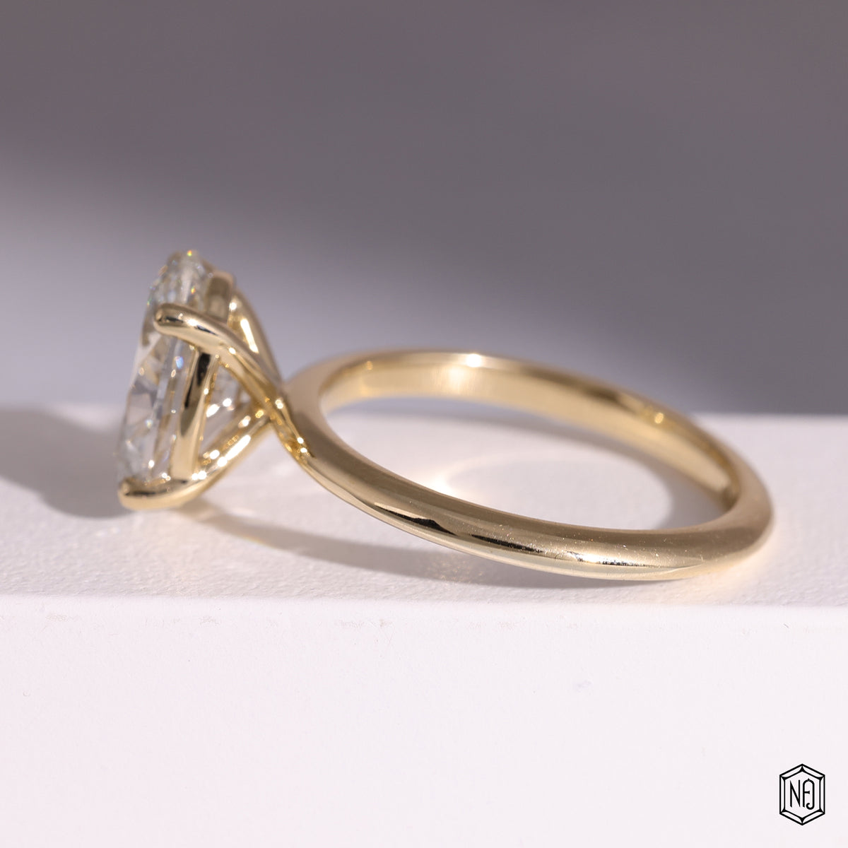 1.56 Carat Oval Cut Lab Grown Diamond Classic Solitaire Engagement Ring - Angled Perspective