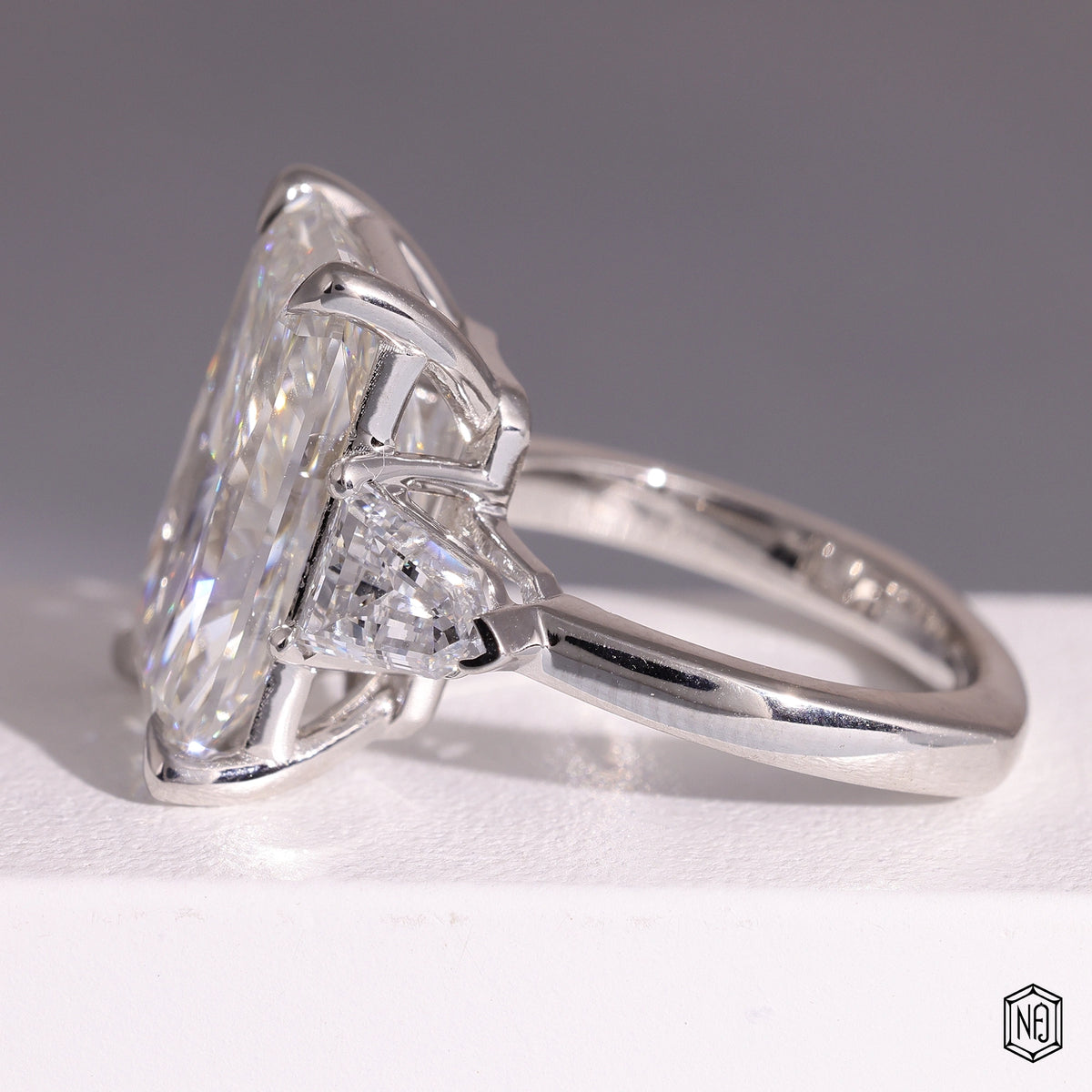 9.58 Carat Radiant Cut Lab Grown Diamond Trellis Three-Stone Engagement Ring - Angled Perspective