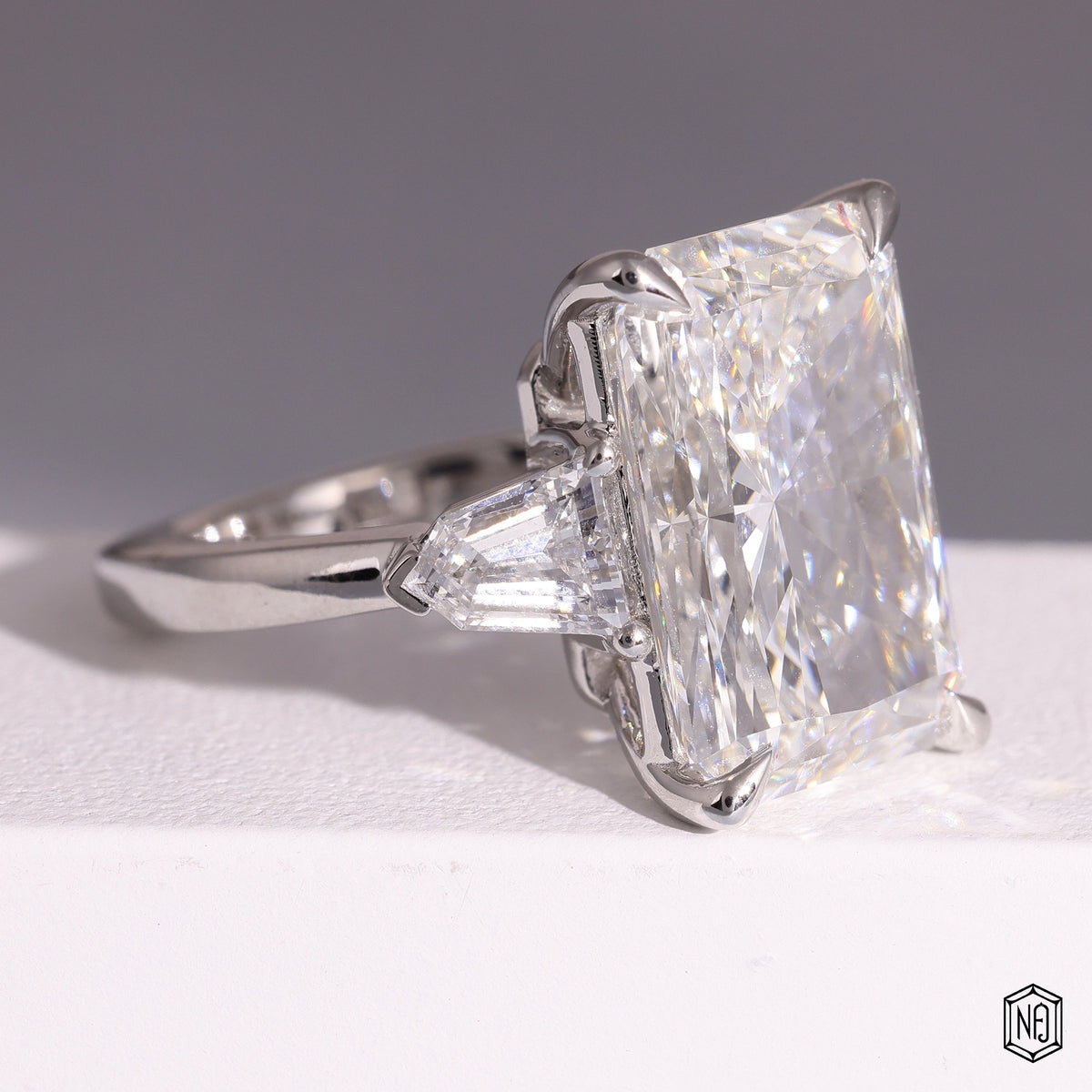 9.58 Carat Radiant Cut Lab Grown Diamond Trellis Three-Stone Engagement Ring - Gallery & Prongs Detail