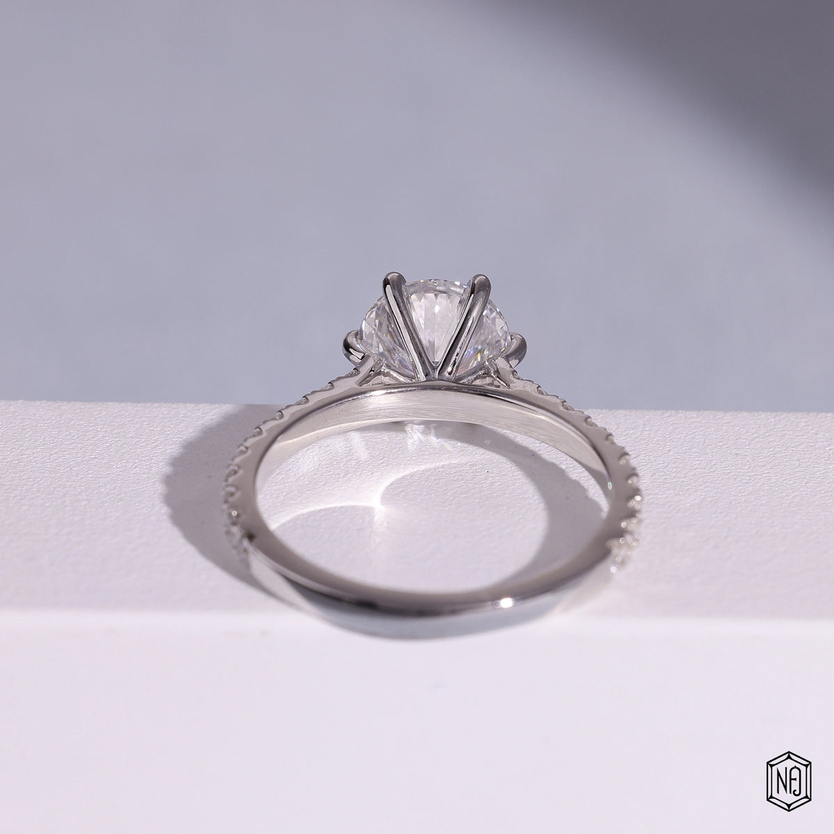 1.86 Carat Round Cut Lab Grown Diamond Side Stone Pavé Engagement Ring - Hand View / Detail Angle