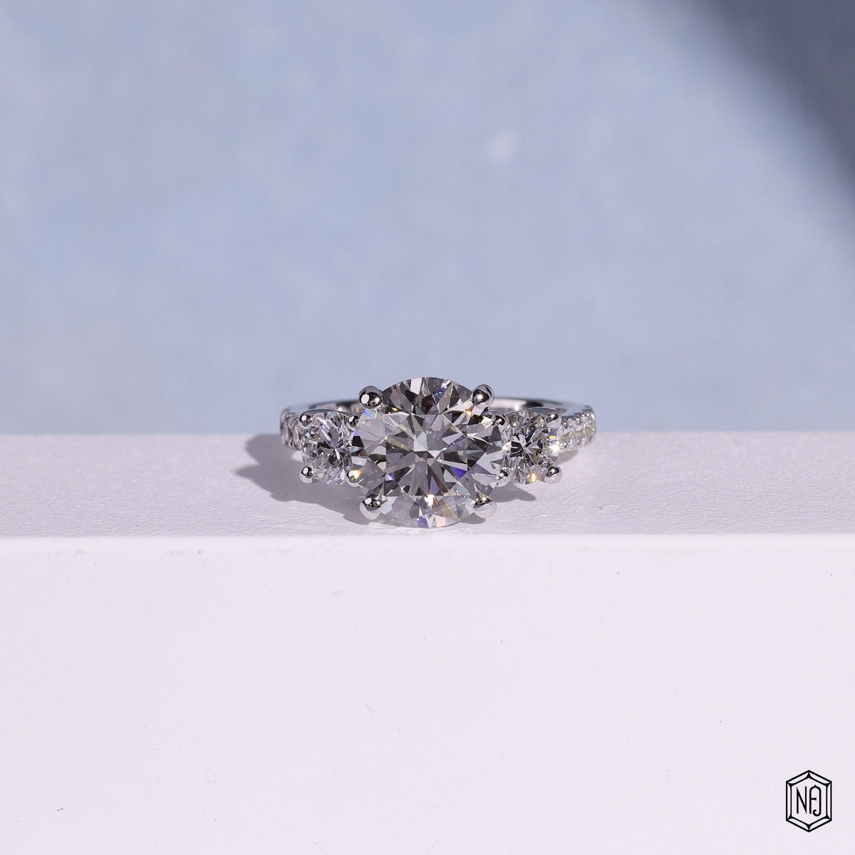 3.12 Carat Round Cut Lab Grown Diamond Trellis Three-Stone Engagement Ring - Front Top View