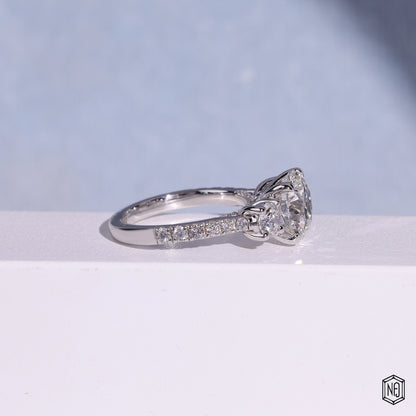3.12 Carat Round Cut Lab Grown Diamond Trellis Three-Stone Engagement Ring - Side Profile Angle