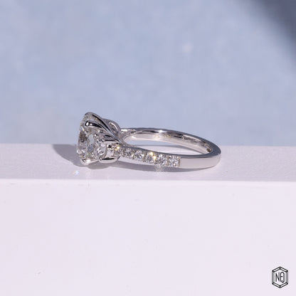 3.12 Carat Round Cut Lab Grown Diamond Trellis Three-Stone Engagement Ring - Angled Perspective