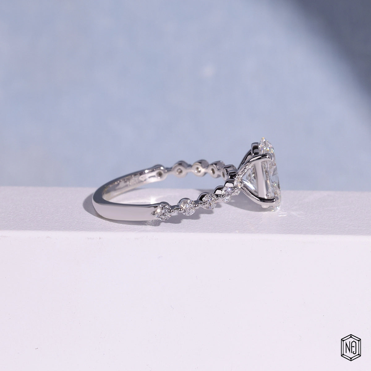 2.57 Carat Oval Cut Lab Grown Diamond Side Stone Pavé Engagement Ring - Side Profile Angle