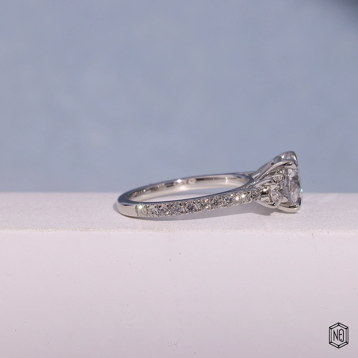 1.73 Carat Round Cut Lab Grown Diamond Trellis Three-Stone Engagement Ring - Gallery & Prongs Detail