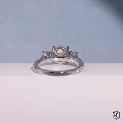 1.73 Carat Round Cut Lab Grown Diamond Trellis Three-Stone Engagement Ring - Angled Perspective