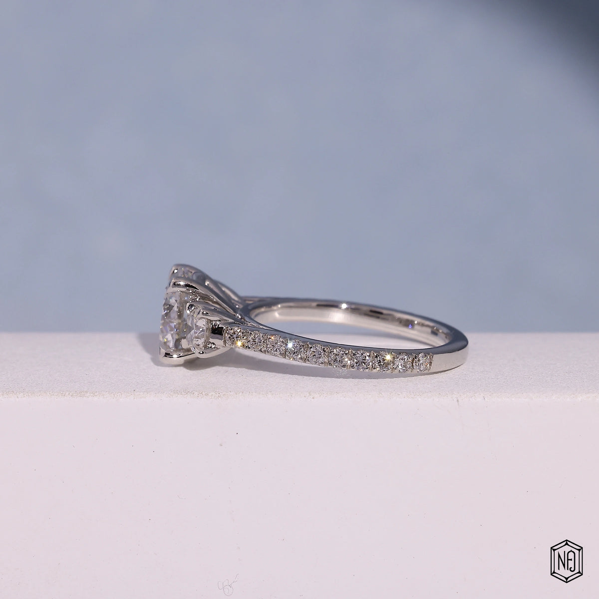 1.73 Carat Round Cut Lab Grown Diamond Trellis Three-Stone Engagement Ring - Side Profile Angle
