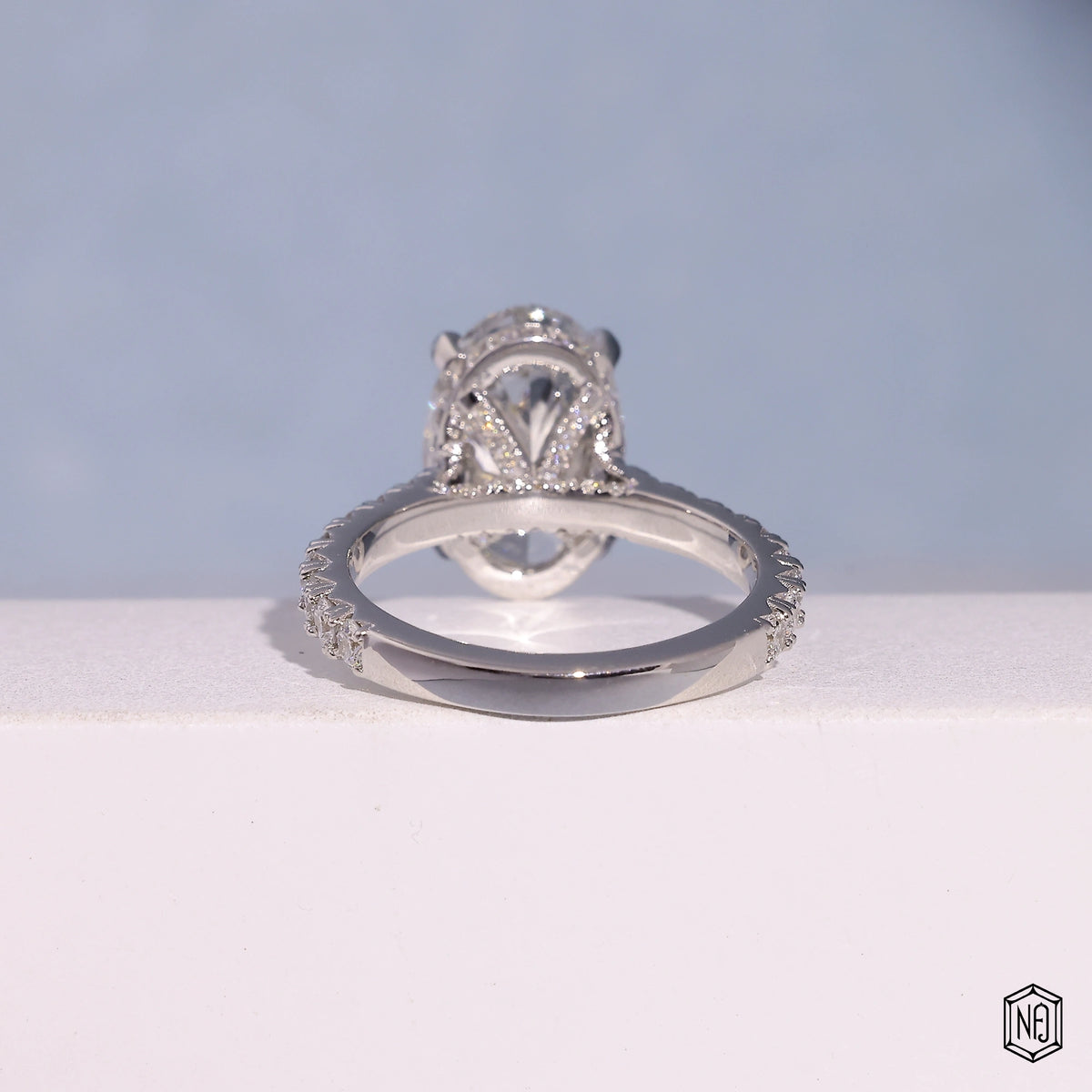 4.3 Carat Oval Cut Lab Grown Diamond Delicate Hidden Halo Engagement Ring - Hand View / Detail Angle