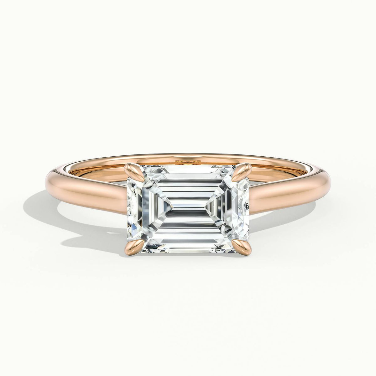 Mira East-West 1.5 Carat Emerald Lab Grown Diamond Hidden Halo Engagement Ring in 10K Rose Gold - view 1