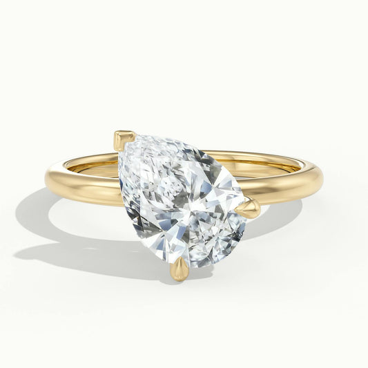 Adela Tilted 2 Carat Pear Lab Grown Diamond Hidden Halo Engagement Ring in 14K Yellow Gold - view 1