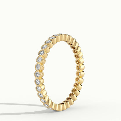 2mm Round Bezel Set Lab Grown Diamond Eternity Ring in 18K Yellow Gold