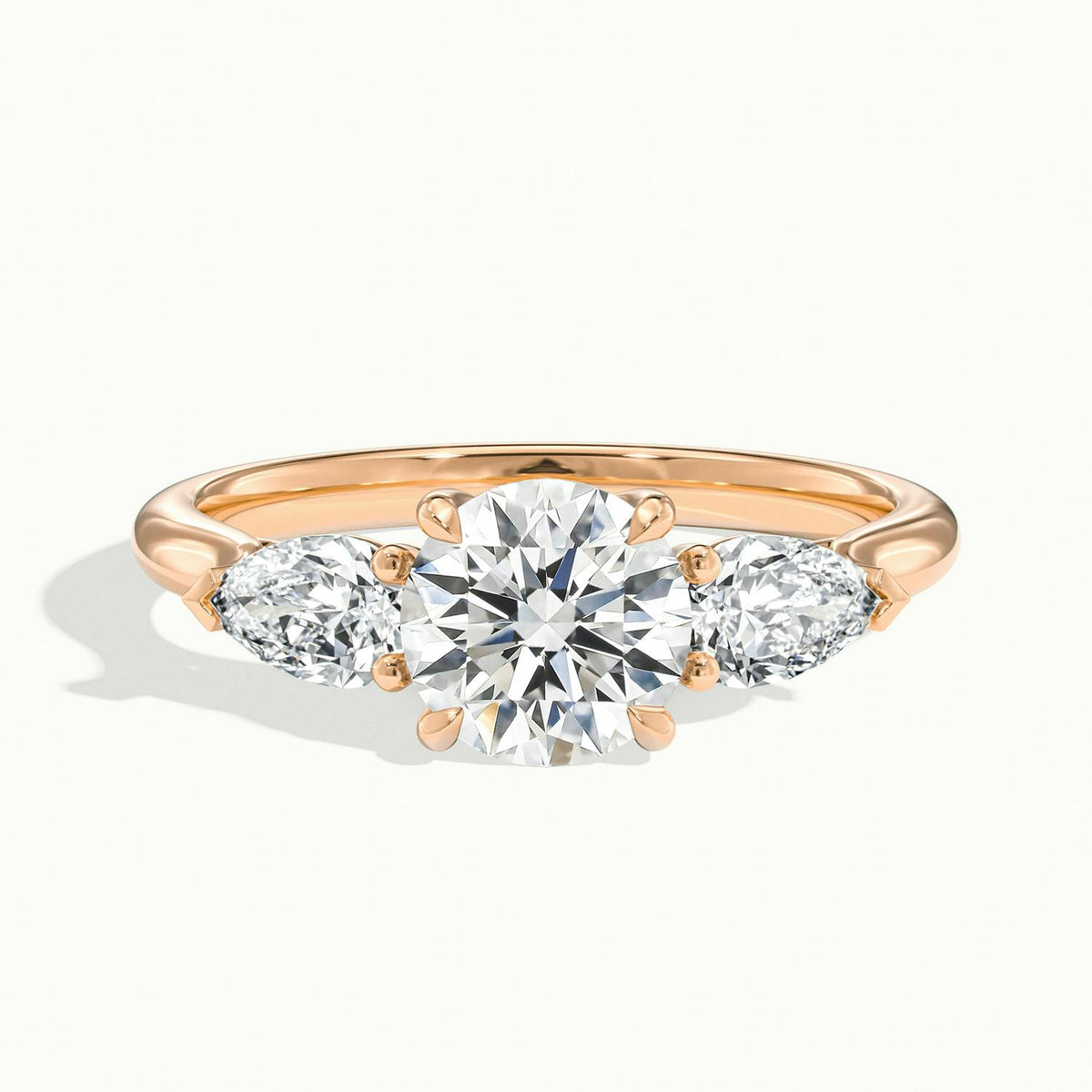 Remy 4.5 Carat Round Lab Grown Diamond Three Stone Engagement Ring in 14K Rose Gold - view 1