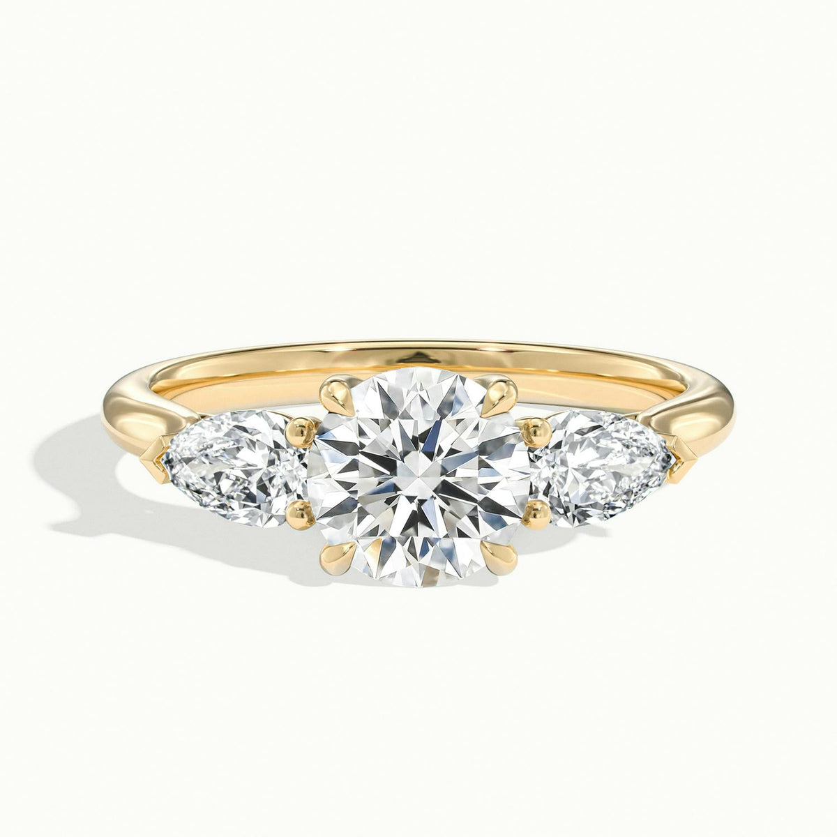 Remy 3 Carat Round Lab Grown Diamond Three Stone Engagement Ring in 10K Yellow Gold - view 1